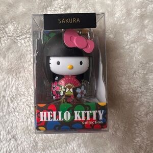 Sanrio Hello Kitty Sakura kokeshi doll keychain - Black and Pink